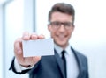 Close up.successful businessman showing his business card Royalty Free Stock Photo