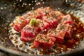 Close up of Succulent Seared Tuna Steaks Sprinkled with Sesame Seeds and Seasonings in a Sizzling Pan