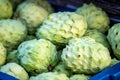 Close up sugar apple piles in market