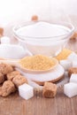 Sugar cubes and cane Royalty Free Stock Photo