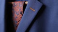 Close-up of suit jacket lapel button hole fabric