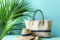 Close-up of a summer beach bag and hat on a sandy beach Royalty Free Stock Photo