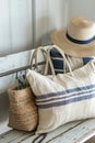 Close-up of a summer beach bag and hat on a sandy beach Royalty Free Stock Photo