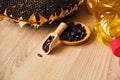 Close-up of a sunflowers, bottle with oil and sunflower seeds Royalty Free Stock Photo