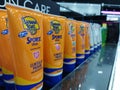 Close-up of sunscreen placed on shelf.