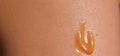 Close up of Sunscreen Protection or Sun Cream on human skin Royalty Free Stock Photo