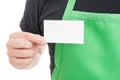 Close-up of supermarket employee showing business card Royalty Free Stock Photo