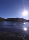 The close-up of the surface of Jiaming Lake. With reflection of sun on the lake Royalty Free Stock Photo