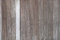 Close-up of surface made of wooden painted white planks.Background texture of old white painted wooden lining boards wall Royalty Free Stock Photo