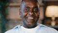 Close up surprised male portrait amazed face American African adult man 60s senior businessman grandfather standing at Royalty Free Stock Photo