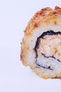 Close-up of Sushi roll with red spices on the outside Royalty Free Stock Photo