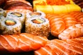 Close-up on sushi, sashimi and california rolls Royalty Free Stock Photo