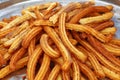 Close up sweet fresh churros snack on tray