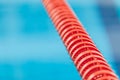 Close up of swim lane in swimming pool. Plastic swimming pool floating wave-breaking lane Royalty Free Stock Photo