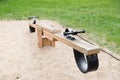 Close up of swing or teeterboard on playground Royalty Free Stock Photo