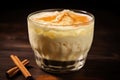 close-up of a swirled glass of rice pudding beverage