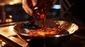 A close-up of a Swiss chocolatier's hand tempering a bowl of molten chocolate, capturing the glossy, velvety texture