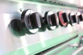 Close up switch of Kitchen burning gas cooker ; knob Royalty Free Stock Photo