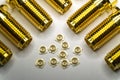 Close-up of symmetric aligned gold plated uFL micro precision radio connector in partial focus white and SMA background