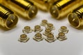 Close-up of symmetric aligned gold plated uFL micro precision radio connector in partial focus white and SMA background