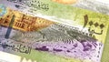 A close-up of a Syrian 1000 Pound banknote reveals intricate art and design.