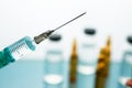 Close up Syringe needle medicine with liquid medicine drop Royalty Free Stock Photo