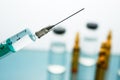 Close up Syringe needle medicine with liquid medicine drop Royalty Free Stock Photo