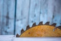 Close up of table circular saw blade. Joiner`s, carpenter`s and carving tools. Notched steel old blade. Industrial background. Royalty Free Stock Photo