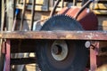 Close up of table circular saw blade in workshop. Woodwork, Work hazards. Dangerous serrated tablesaw Royalty Free Stock Photo