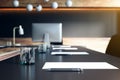 Close up of table with objects in modern conference room. Blurry interior background. Workplace concept. Royalty Free Stock Photo