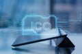 Close up of tablet with creative ICO chip hologram on blurry office desktop background. Initial coin offering concept. Double Royalty Free Stock Photo