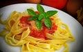 Tagliatelle, tomato and basil plate