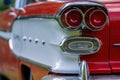 Close up of the tail light of a classic American car from the fifties