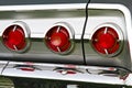 Close up tail lights on a vintage car.