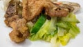 The close up of Taiwanese fried pork chop and stir fried vegetable