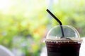 Close up of take away plastic cup of iced Americano Royalty Free Stock Photo