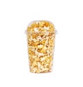 Take away popcorn in close plastic glass for sale isolated on white background , clipping path