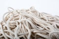 Close up of tangled rope part background on white