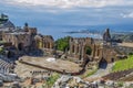 Close-up of the taormina theater and panoramic view of the surrounding coast Royalty Free Stock Photo