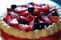 Tart with berries and custard, festive cake Royalty Free Stock Photo