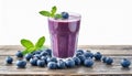 Tasty blueberry smoothie in glass isolated on white background. Delicious and healthy beverage