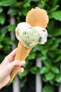 Close-up tasty cold italian ice cream in woman's hand outdoors