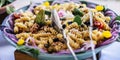 Close up of tasty and colorful recipe full of italian fusilli pasta with vegetables and tuna - healthy mediterranean diet