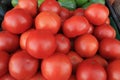 Close up of tasty delicious red tomatoes at the Farmers Market fruit stand in Los Angeles Royalty Free Stock Photo