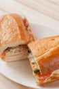 French bread sandwich with smoked chicken and bacon salad Royalty Free Stock Photo