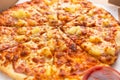 Tasty hawaiian pizza with ham and pineapple Royalty Free Stock Photo