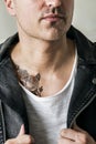 Close up of tattoo on the chest of a man