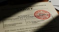 Close-Up of Tax Document with Red Official Stamp and Data Entry Royalty Free Stock Photo
