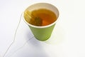 Close up tea bag in paper cup Royalty Free Stock Photo