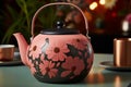 Close-up Tea Pot in Peach Fuz Color on Green Table, Traditional Tea Ceremony Concept